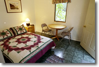 The Cabins fully supplied kitchenette
            private bath
            linens
            Cable TV